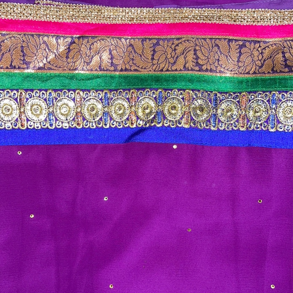 Purple saree with contrast pink blouse